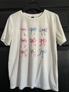 SHEIN white T-shirt with bows